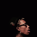Wiz Khalifa smokes